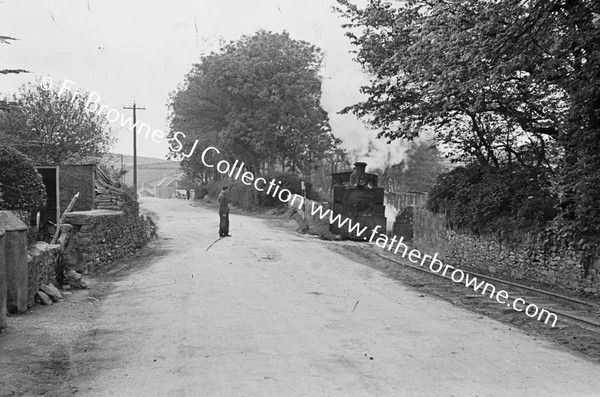 DINGLE TRAIN ON MAIN ROAD